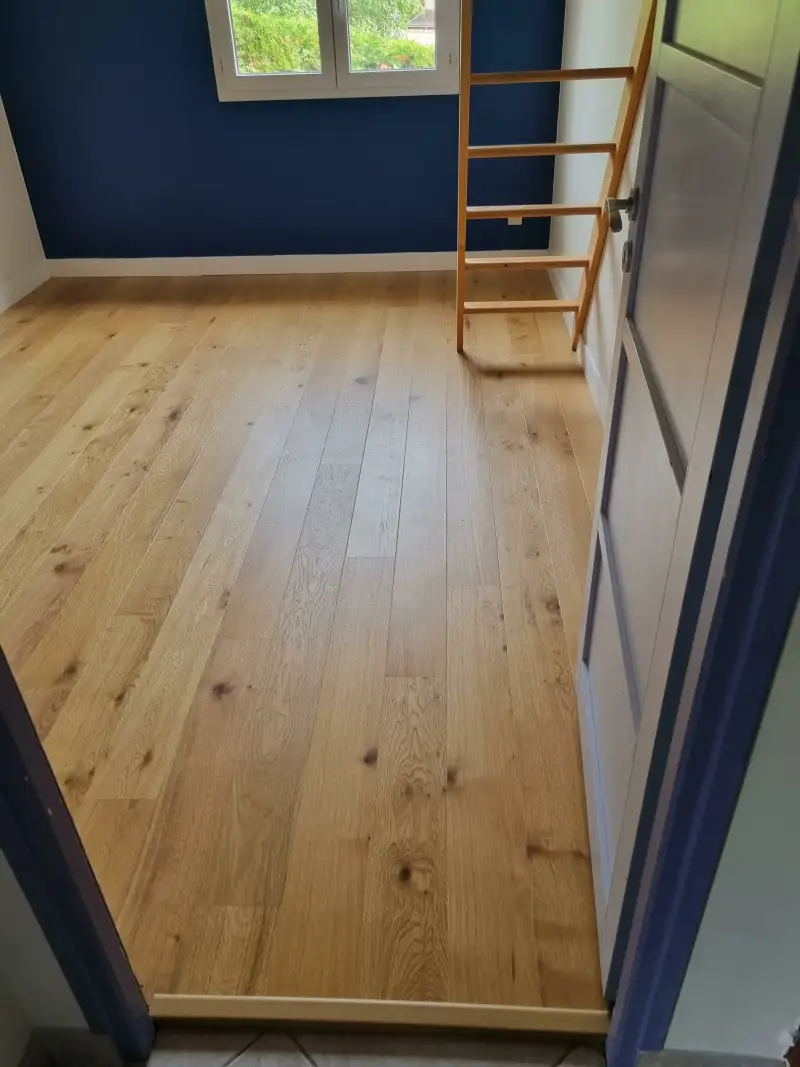 Pose expert de parquet en bois par AML RENOVATION à Mons